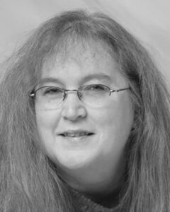 The Bookworm is Terri Schlichenmeyer. Terri has been reading since she was 3 years old and she never goes anywhere without a book. She lives on a prairie in Wisconsin with two dogs, one patient man, and 20,000 books.