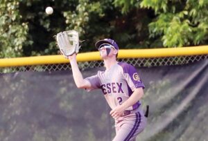 Essex center fielder Hunter Byrd prepares to catch a fly ball during the Trojans’ loss to Northumber- land.