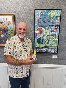 Robert Placky with his Honorable Mention, The Twenty-two.