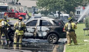 There were no injuries reported as the result of a car fire in the Lake Drive Town Homes on July 4, but the flames caused damage to the siding on a nearby building. Photo by Victor Burrell.
