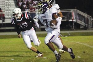Essex’s Mar’Keise Braxton finds open space en route to a 40-yard punt return against Lancaster Friday night.