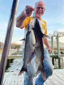 Michael Schwarz, associate director of the Virginia Seafood Agricultural Research and Extension Center, displays his catch of blue catfish. (Photo courtesy of Michael Schwarz)
