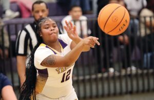 Lady Trojan Aryeon Robinson delivers a pass during Essex’s season-opening win over West Point.